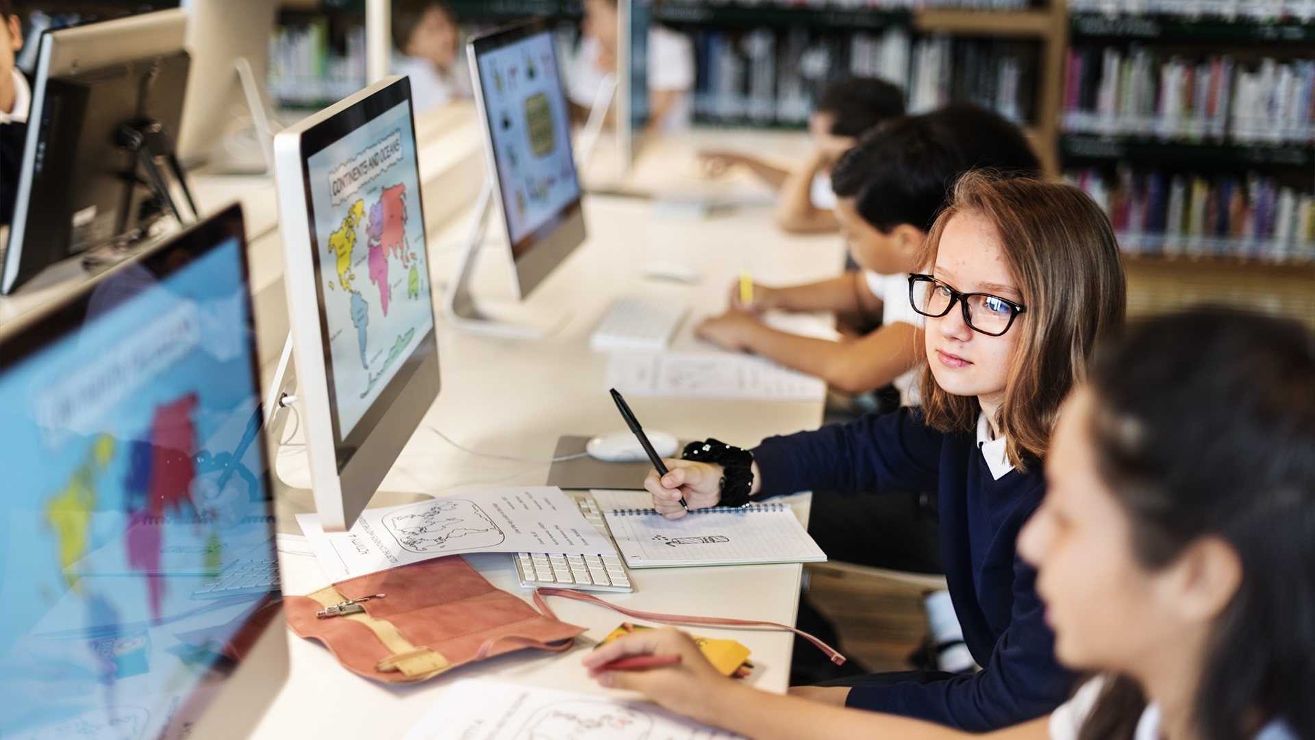 children working at computer stations