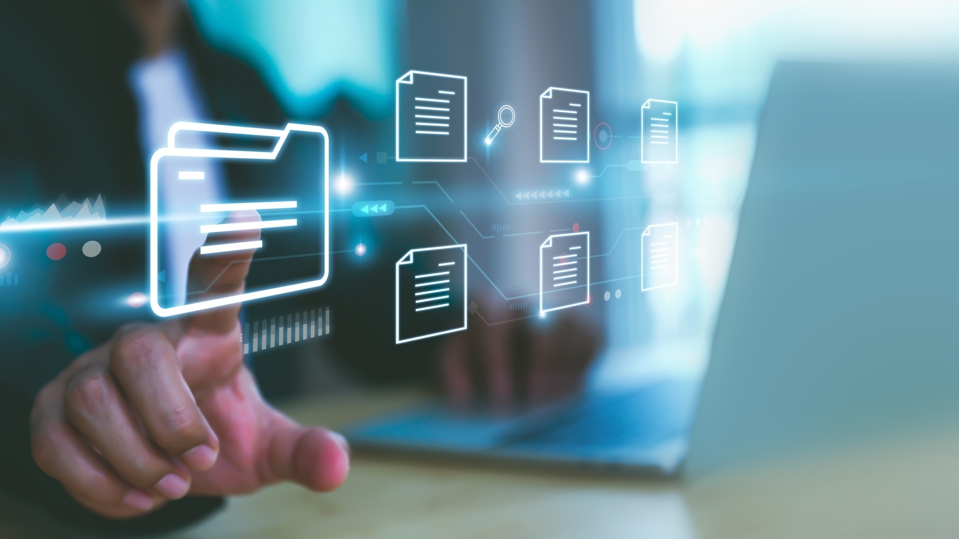 Person's hand reaching out to touch floating and glowing UI with icons of files and folders.