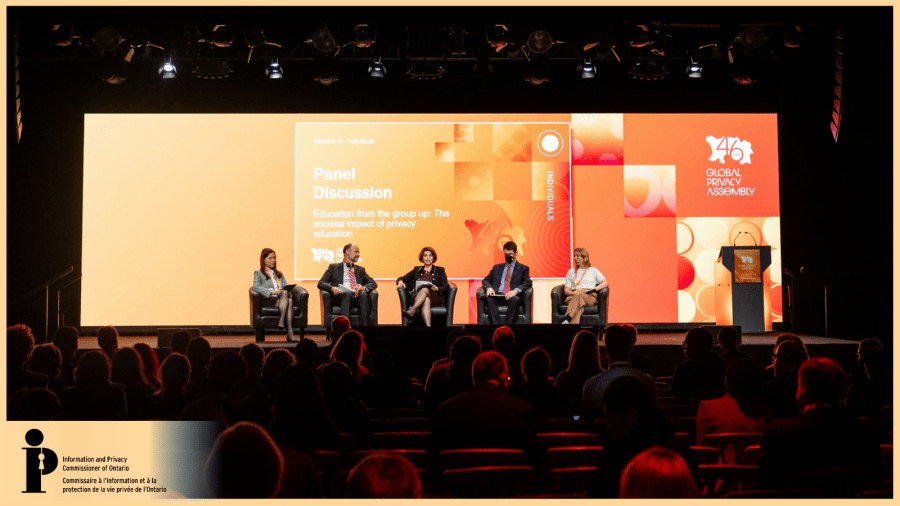 Candid photo of GPA Panelists sitting on stage together