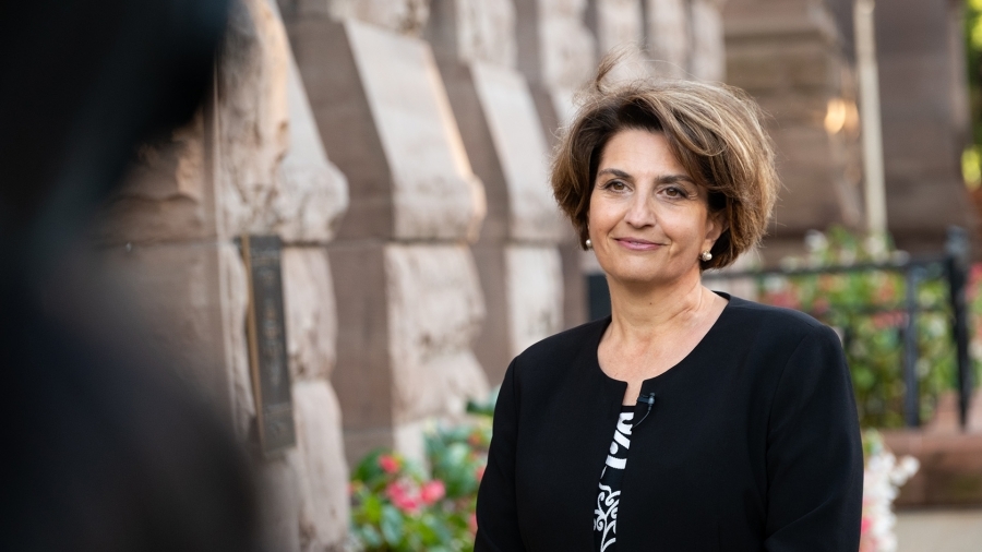 Commissioner Kosseim standing in front of the Ontario Legislature.