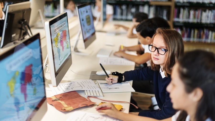 children working at computer stations