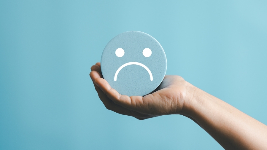A blue frowny face.