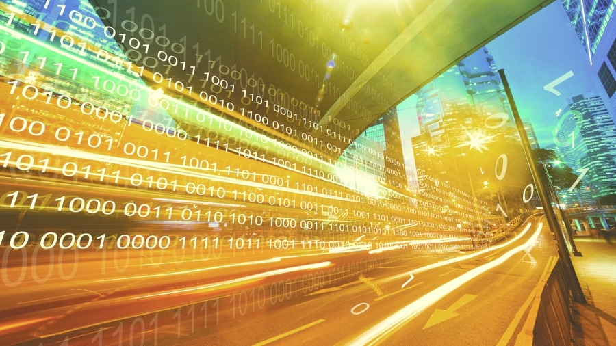 A digital illustration of binary data over a highway.