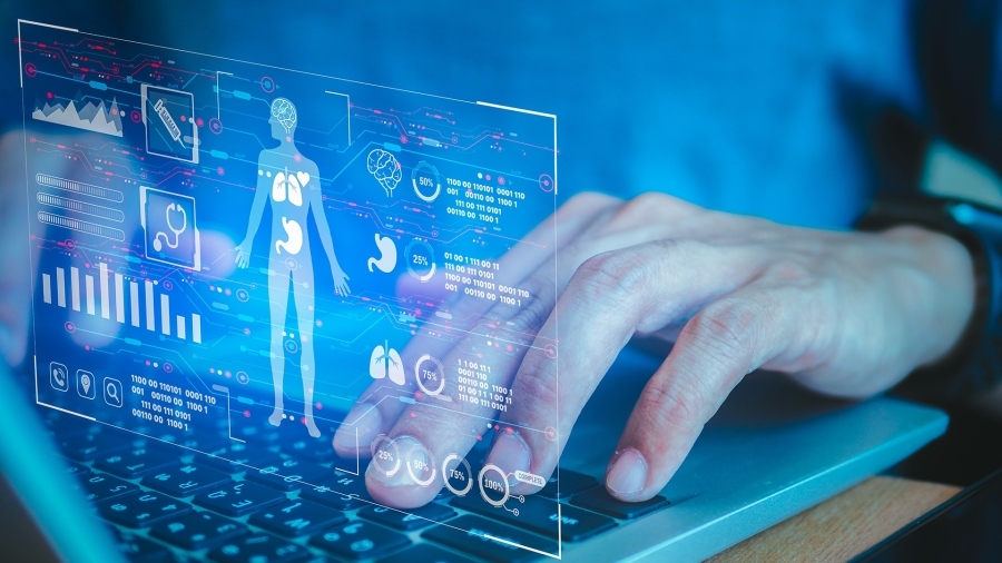 A person using a computer that shows personal health information.