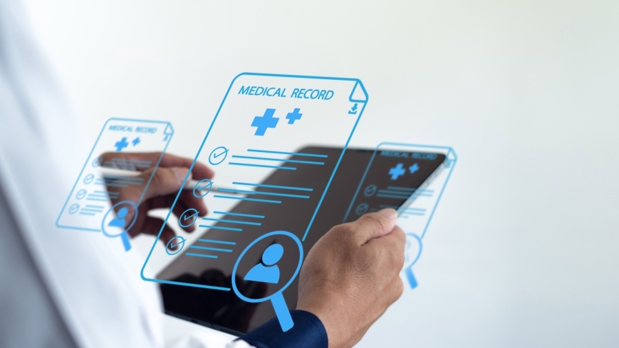 A doctor electronically accessing health records.