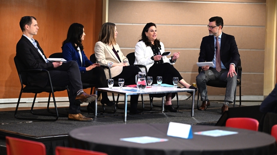 IPC Data Privacy Day event panel members having a discussion on stage.