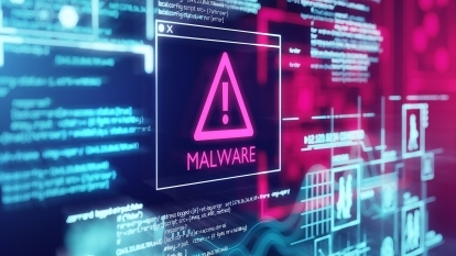 A computer screen with a pink warning symbol and text that says "Warning!"