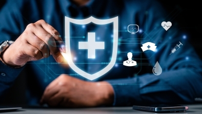 A doctor touching a shield icon, symbolizing privacy.
